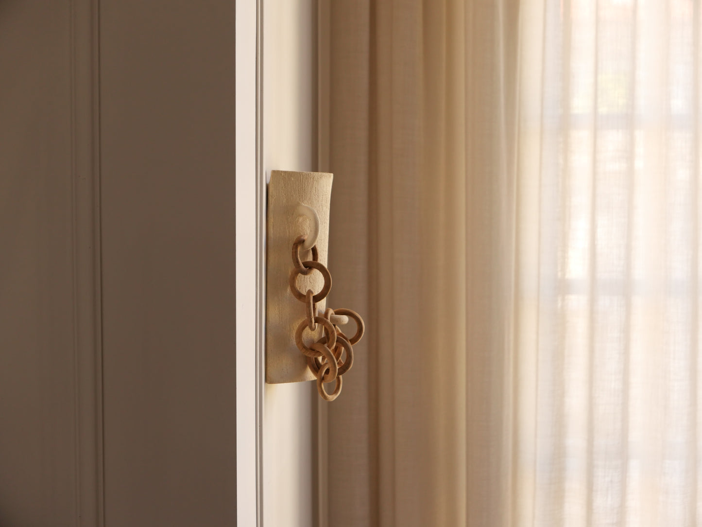 Applique Terra (chaîne en bois)